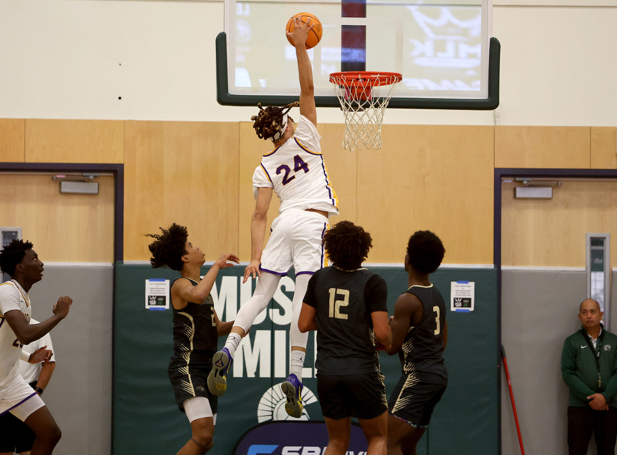 Zion Sensley soars above the crowd in Monday's MLK Classic at De La Salle